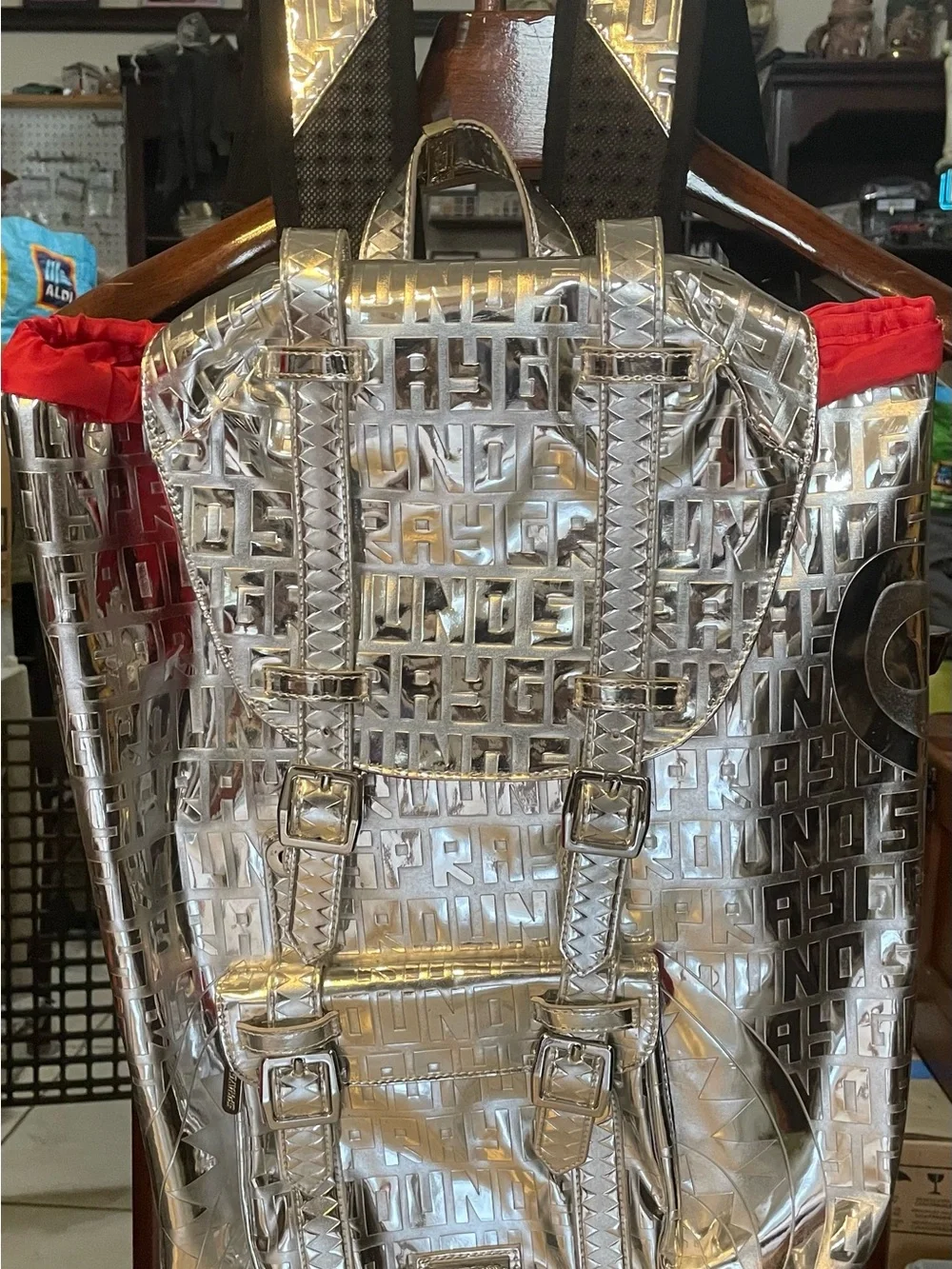 Sprayground Metallic Silver Logo Backpack with Red Accents